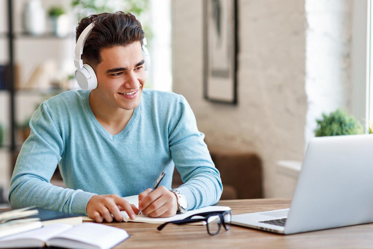 Man learning accounting online at home
